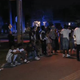 Several partygoers outside the Plantation, Fla., home where police say a gunman opened fire, killing one and wounding four March 19, 2016.
WSVN screenshot
